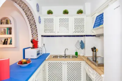 Una cocina o zona de cocina en Marine Oasis, Duplex with Pool by the Sea