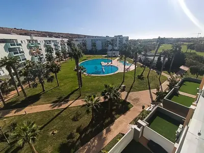 Piscina en o cerca de ALMERIMAR GOLF AND PoOL APARTMENT
