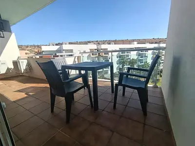 Un balcón o terraza de ALMERIMAR GOLF AND PoOL APARTMENT