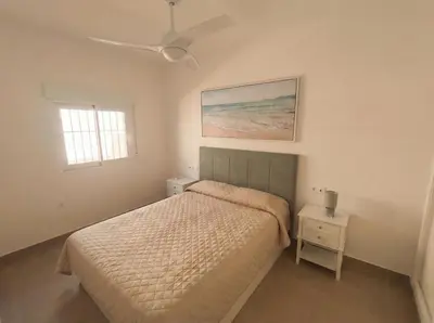 Cama o camas de una habitación en Apartamento 1ª Linea de la playa con Vistas al mar