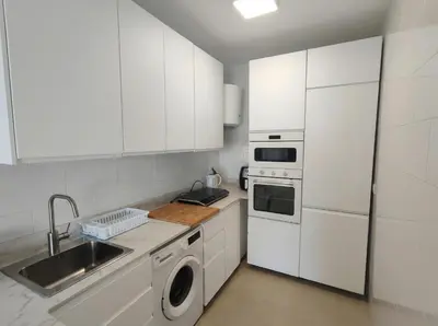 Una cocina o zona de cocina en Apartamento 1ª Linea de la playa con Vistas al mar