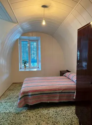 Cama o camas de una habitación en Casa cueva vistas al mar