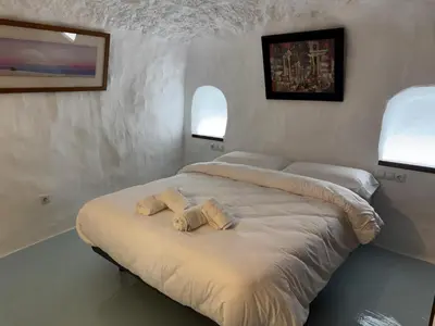 Cama o camas de una habitación en Cuevas La Veranda Orce
