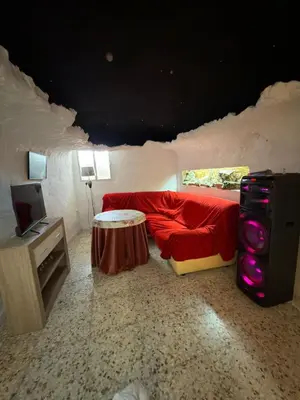 Una televisión o centro de entretenimiento en Casa Cueva Conde