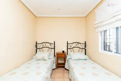 Cama o camas de una habitación en Sunny penthouse with large terrace and pool in Vera