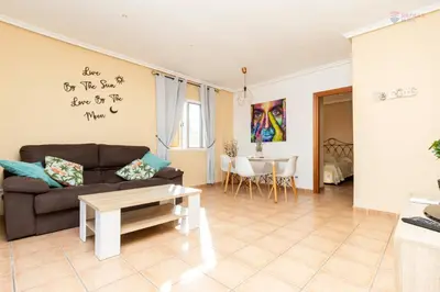 Zona de estar de Sunny penthouse with large terrace and pool in Vera