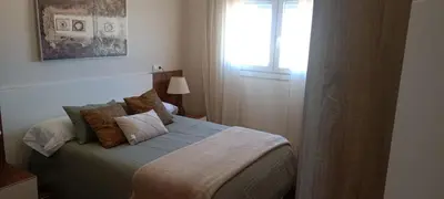 Cama o camas de una habitación en Vivienda en el centro de Alhama de Almería