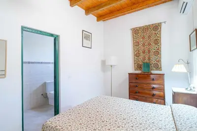 Cama o camas de una habitación en Olivo, Finca del Alamo