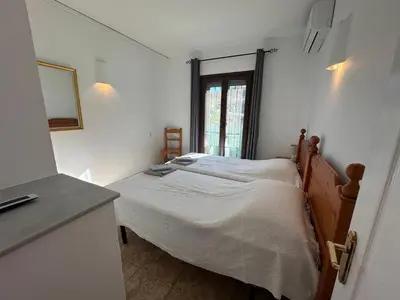Cama o camas de una habitación en La Parata Apartments