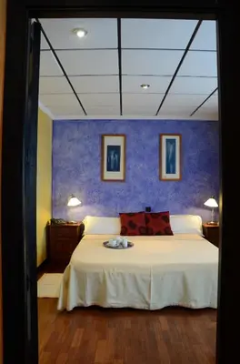 Cama o camas de una habitación en Hotel Tikar