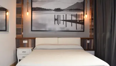 Cama o camas de una habitación en Hotel Mirablau