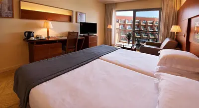 Cama o camas de una habitación en Protur Roquetas Hotel & Spa