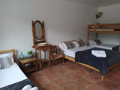 Cama o camas de una habitación en Hotel Rural La Marmita de Ahlam