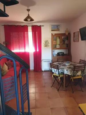 Una televisión o centro de entretenimiento en Isleta del Moro TERRAZA VISTAS MAR Exclusiva 60 m2 WIFI