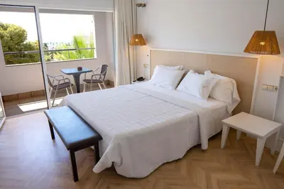 Cama o camas de una habitación en Hotel MC San José