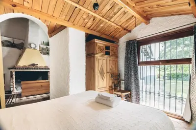 Cama o camas de una habitación en Casas Cueva Tio Tobas Guadix