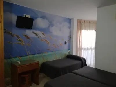 Una televisión o centro de entretenimiento en Hostal Maribel