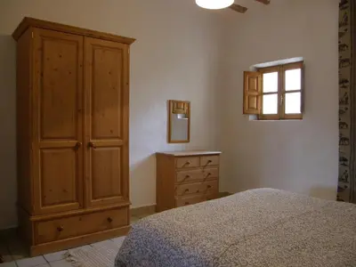 Cama o camas de una habitación en Cortijo Romero