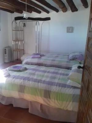 Cama o camas de una habitación en El Tinao