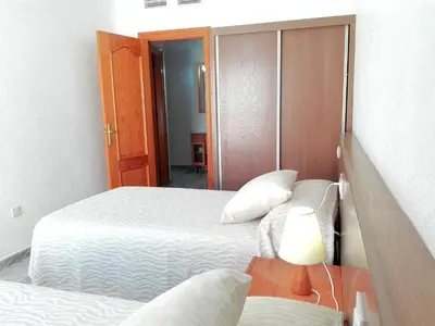 Cama o camas de una habitación en Casa Paqui