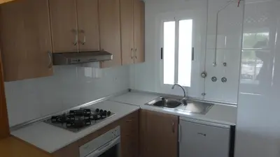 Una cocina o zona de cocina en Apartamentos Golf Center