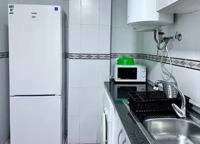 Una cocina o zona de cocina en Apartamentos Arcos Duplex Águilas