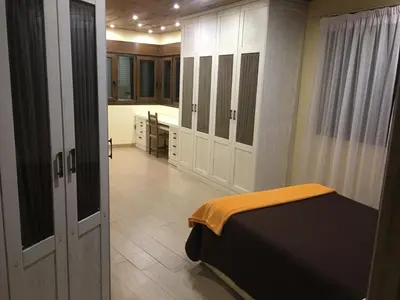 Cama o camas de una habitación en Hostal Mulhacén
