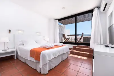 Cama o camas de una habitación en Calachica Las Negras Hotel Boutique