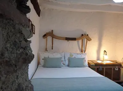 Cama o camas de una habitación en La Abuela Mercedes en Trevélez