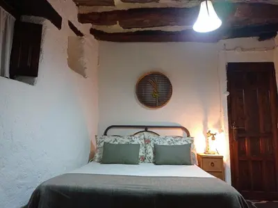 Cama o camas de una habitación en La Abuela Mercedes en Trevélez