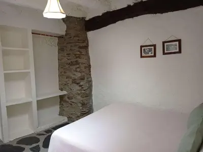 Cama o camas de una habitación en La Abuela Mercedes en Trevélez