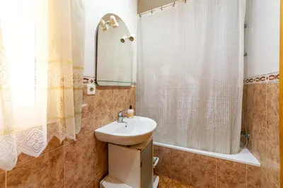 Un baño de Apartamento Merlin
