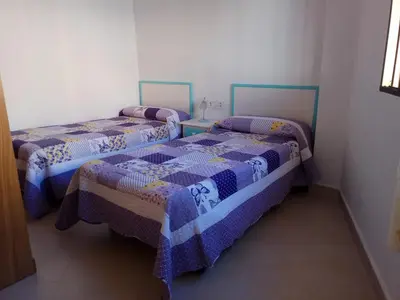 Cama o camas de una habitación en Apartamento Los Flamencos