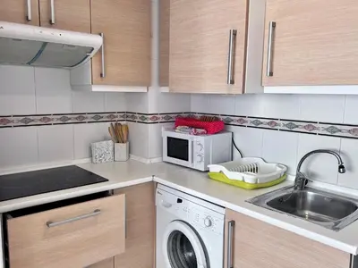 Una cocina o zona de cocina en Apartamentos Arcos Céntrico
