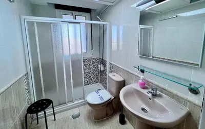 Un baño de Apartamentos Arcos Céntrico