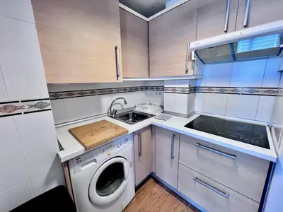 Una cocina o zona de cocina en Apartamentos Arcos Céntrico