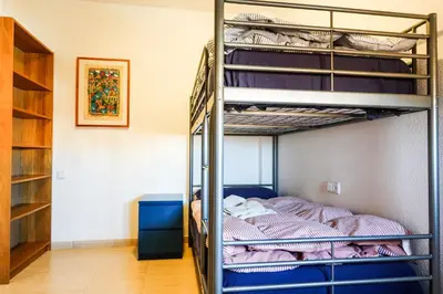 Cama o camas de una habitación en Atico Alhamilla