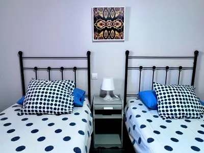 Cama o camas de una habitación en Apartamentos Arcos Costa Cálida
