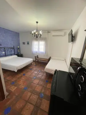 Cama o camas de una habitación en La Hacienda del Marquesado