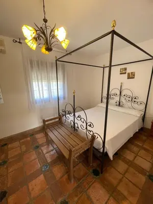 Cama o camas de una habitación en La Hacienda del Marquesado