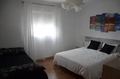 Cama o camas de una habitación en Cortijo Rural El Escondite