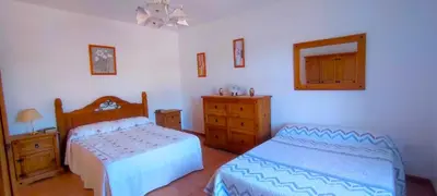 Cama o camas de una habitación en La Cabañuela