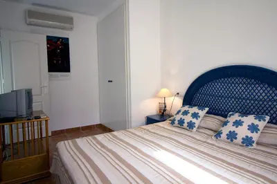 Cama o camas de una habitación en Arto Blanco