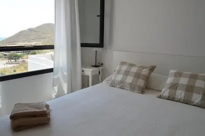 Cama o camas de una habitación en Apartamentos Macenas