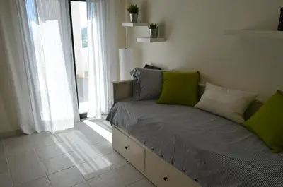 Cama o camas de una habitación en Apartamentos Macenas