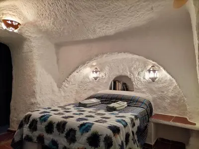 Cama o camas de una habitación en Casa Cueva Guadix