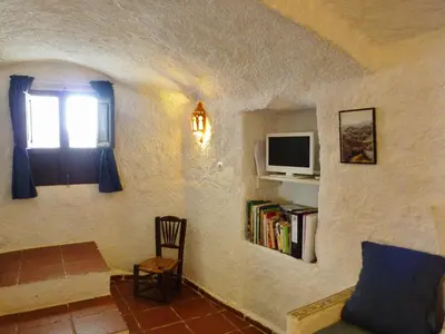 Una televisión o centro de entretenimiento en Casa Cueva Guadix