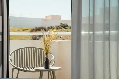 Un balcón o terraza de Hostal La Isla