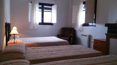 Cama o camas de una habitación en Al sur de Granada