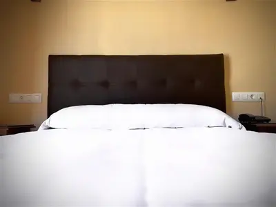 Cama o camas de una habitación en Hostal Restaurante La Curva